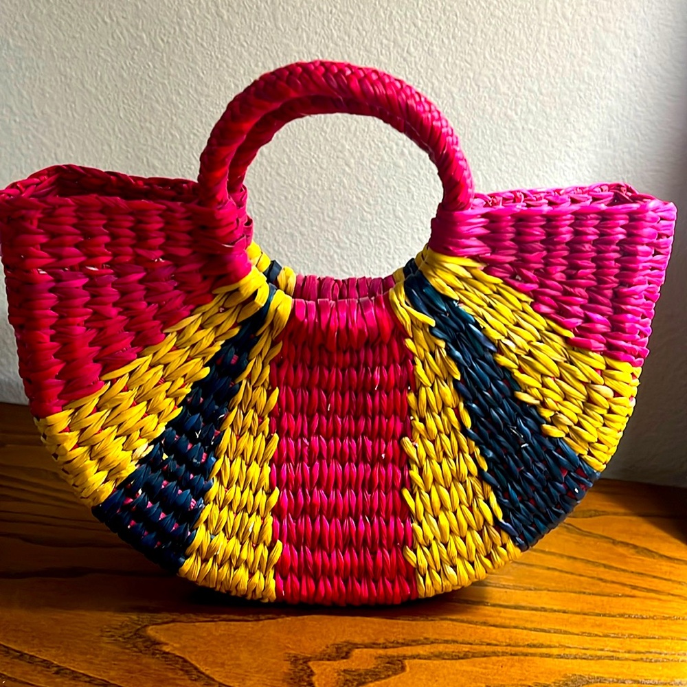 Woven multi colored handbag